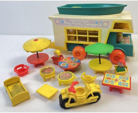 A vintage Fisher Price Play Family Camper van with Boat and accessories. Age related sun fading to camper and some decals. Ac