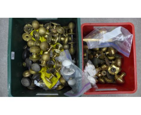 architectural salvage - two boxes of doorknobs, mainly brass, etc  (2) 