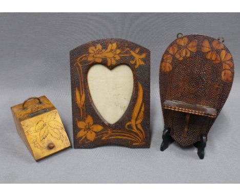 Collection of late 19th / early 20th century pokerwork to include a photograph frame, wall shelf and miniature purdonium, 12 