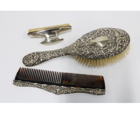 Edwardian silver backed hair brush and comb, Chester 1907 and a silver backed nail buffer (3) 