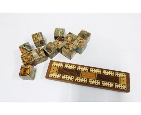Late 19th / early 20th century cribbage board and a set of building bricks with animal patterns 