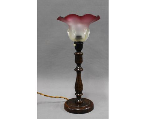 Oak table lamp base with frilled shade in opaque and cranberry glass,  39cm including shade 