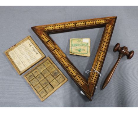 Antique cribbage board and markers together with La Taquin, a French number game and a small gavel. (3) 