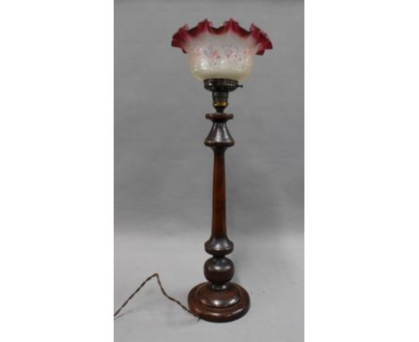 Mahogany table lamp with red frilled glass shade. 61cm. 