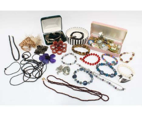 A collection of silver jewellery to include a chain with glass witches ball pendant, a Thomas Sabo pendant and other costume 