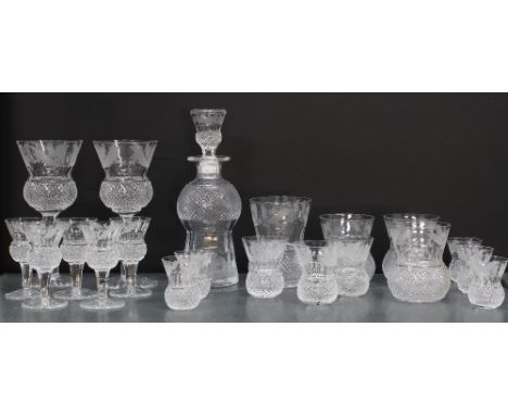 A part suite of Edinburgh Crystal thistle patterned glass to include a small decanter and stopper, 20cm high  and various gla