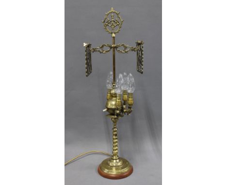 Brass table lamp base with four arms on lion supports, barley twist column and circular wooden base, 64cm 