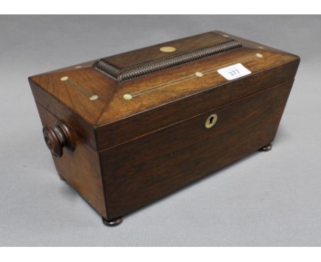 Rosewood sarcophagus tea caddy, hinged lid with abalone inlay, with glass mixing bowl to the interior flanked by lead line co