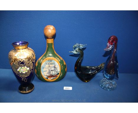 Two Murano style Birds, a blue and gilt Vase and a leather covered souvenir Decanter.