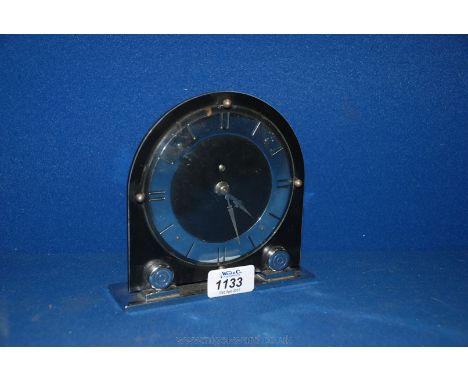 An Art Deco black faced Mantle Clock.