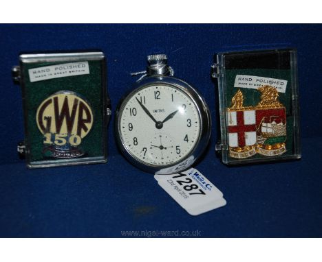 A Smiths Pocket Watch and enamel Badges.