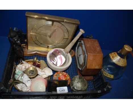 A quantity of miscellanea including shells, a Dimple bottle, Hydralon glass Paperweight, Smiths wooden mantle  Clock, Three s