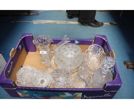 A quantity of cut glass including bowls, decanter, bell, rose bowls, cake plates etc.