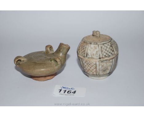 A rare and attractive small celadon glaze Thai pottery squat oil Lamp with wick and two ring handles and a Thai Sawankahlok m