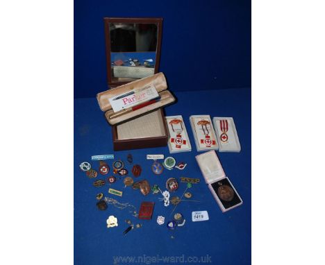 Miscellaneous Enamel Badges, Red Cross medals and a Parker 61 Cartridge Pen, a/f.