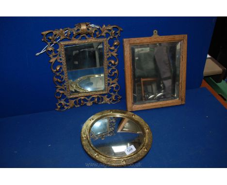 A Brass openwork framed Mirror, 13 1/2'' x 10 1/4'', a small Oak framed Mirror, 11 1/2'' x 10'' and a circular Brass framed c