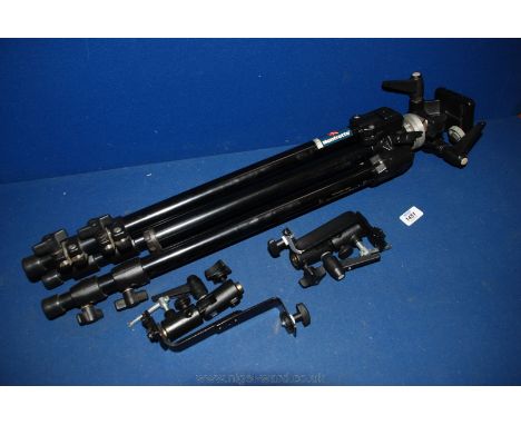 A Manfrotto 144B professional photographic Tripod with a #115 Head, together with two adjustable brackets.