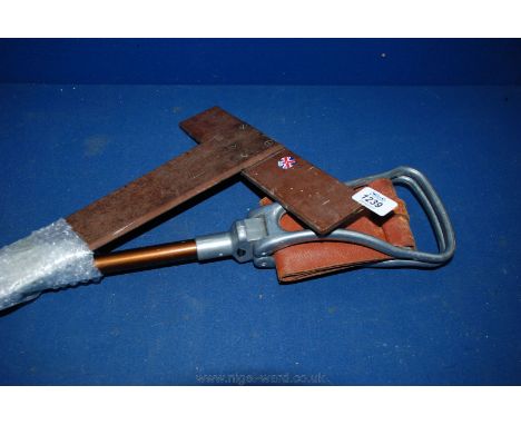 A shooting Stick and a wooden set Square.