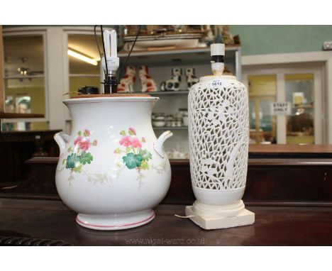 A pierced oriental Lamp Base and a large Victorian two handled Vessel converted into a table lamp.