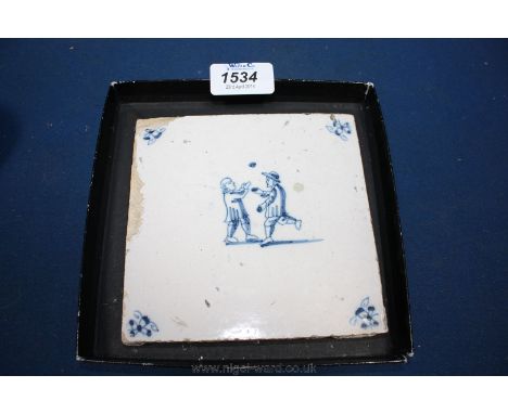 An early 17th c. example of a Delft Tile showing two men playing a ball game