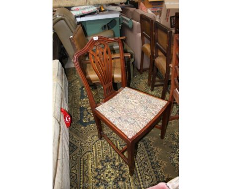 A modern Mahogany finished Sheraton style Dining Chair with hump back, pierced, fret cut splat and stylised tapestry print dr