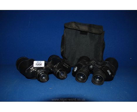 A pair of Stoneridge 10 x 50 (ruby coated) Binoculars in canvas case and a pair of Skybolt 10 x 50 Binoculars