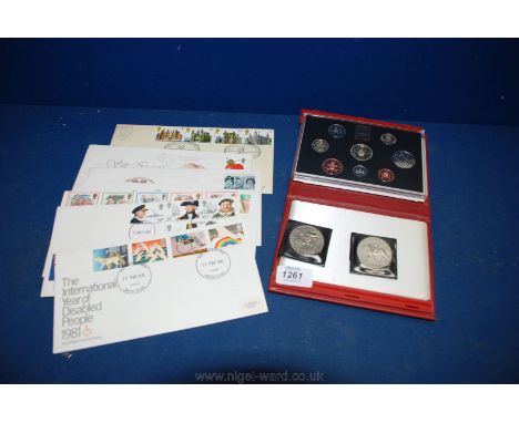 A boxed, 1994 Royal Mint Proof Coin Set of current UK coins, two Queen Elizabeth II silver jubilee Crowns and seven Royal Mai