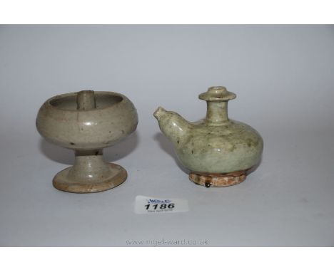 A Sawankhalok oil lamp of highly unusual form with central wick within a raised bulbous well 14th-15th century and a miniatur