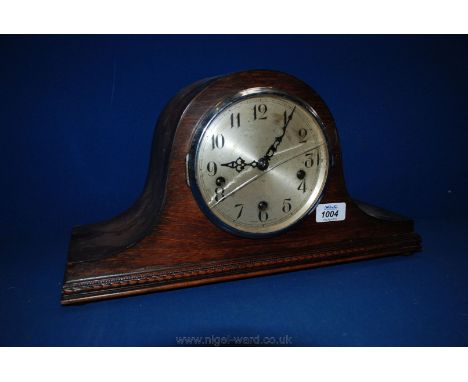 A Napoleon hat style mantle Clock, no key or pendulum and glass cracked.
