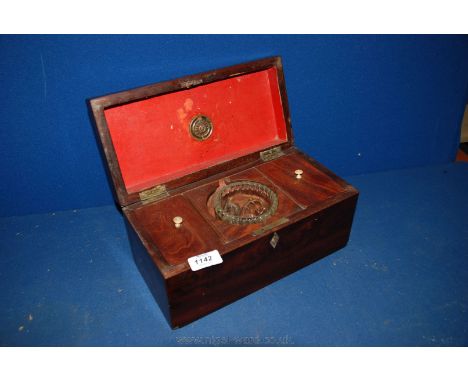 A Mahogany Tea Caddy with replacement bowl, (lock escutcheon missing)