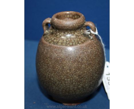 An attractive and early crackle glaze Jartlet with twin ring handles probably Chinese, Song or Yuan period c. 13th century, 4