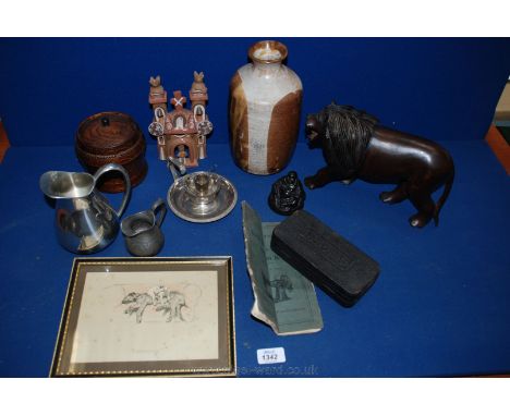 A quantity of miscellanea including a carved Lion, wooden biscuit barrel, small Alden print, pottery vase, etc.