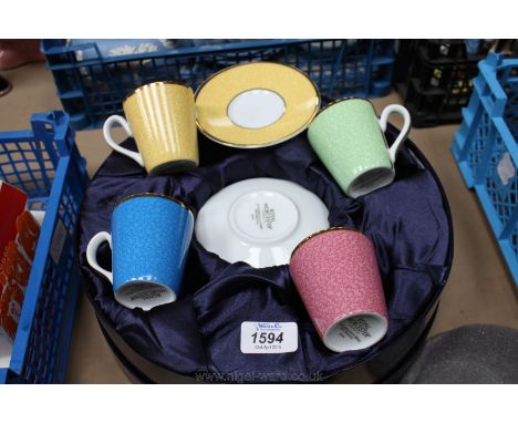 A boxed set of four Royal Worcester coffee Cups and saucers.