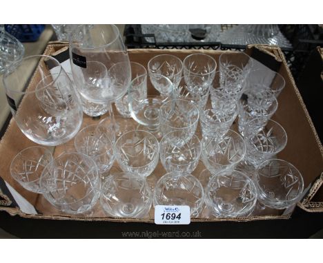 A large quantity of cut glass Glasses including sherry and a pair of Darlington crystal wine glasses.