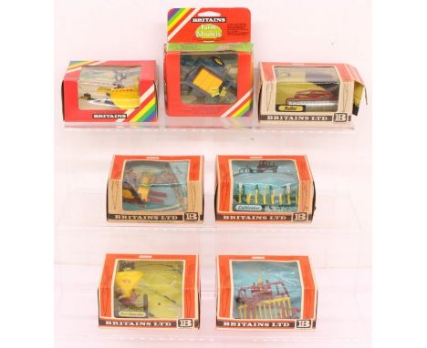 Britains: A collection of seven boxed Britains Farm Implements, to comprise: 9543, 9538, 9533, 9536, 9531, 9551 and 9552. Ori