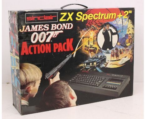 Sinclair: A boxed Sinclair ZX Spectrum +2: James Bond Action Pack. Containing: Light Gun, Power Supply, Instruction Manual, Z