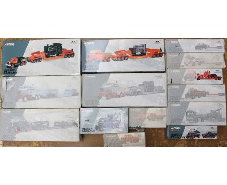 Corgi: A collection of assorted boxed Corgi: Heavy Haulage vehicles. Most appear with sealed tissue wrap around them. Those w