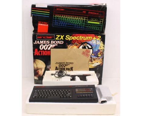 Sinclair: A boxed Sinclair ZX Spectrum +2: James Bond Action Pack. Containing: Light Gun, Power Supply, and ZX Spectrum +2 Ac