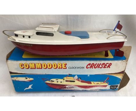 Sutcliffe: A boxed Sutcliffe Commodore Cruiser, clockwork tinplate model boat. Good condition with smooth running motor, key 