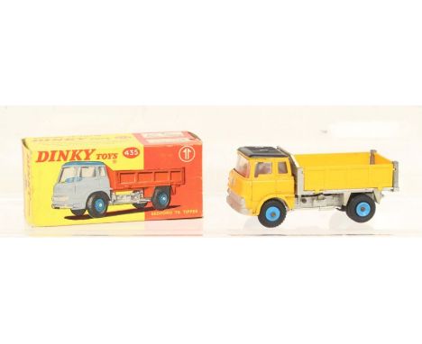 Dinky: A boxed Dinky Toys, Bedford TK Tipper, Reference 435. Rare yellow cab with silver chassis and silver back with plastic