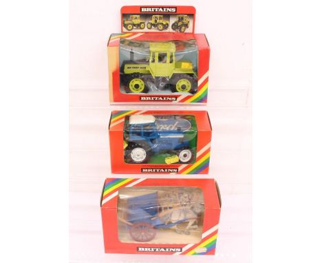 Britains: A collection of three boxed Britains items, to comprise: Mercedes-Benz Tractor, Catalogue No. 9525; Ford TW20 Tract