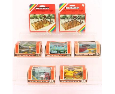 Britains: A collection of seven boxed Britains Farm Implements, to comprise: 9548, 9535, 9544, 9536, 1716 (two examples) and 