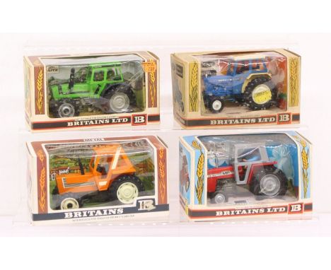 Britains: A collection of four boxed Britains tractors, to comprise: Catalogue No. 9522, 9528, 9524, and and 9526. Original b