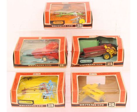 Britains: A collection of five boxed Britains Farm Implements, to comprise: 9546, 9556, 9540, 9541 and one other. Original bo