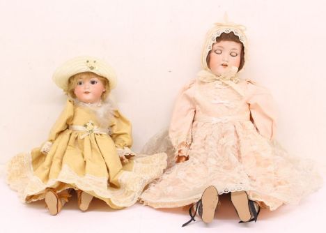 Armand Marseille: A pair of Armand Marseille bisque head dolls, both with jointed composition body, open and close eyes with 