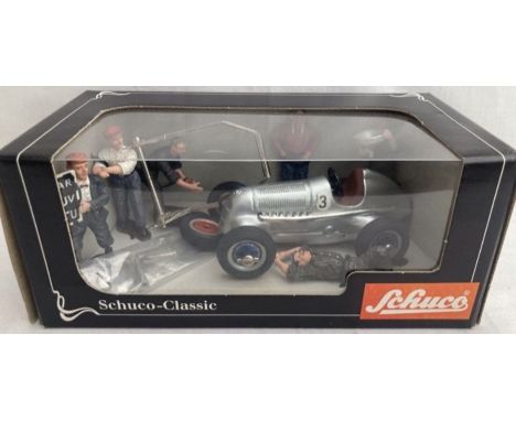 Schuco: A boxed Schuco Mercedes Silver Arrow with figures. Set no. 01017. Boxed in good condition.&nbsp;Please assess photogr