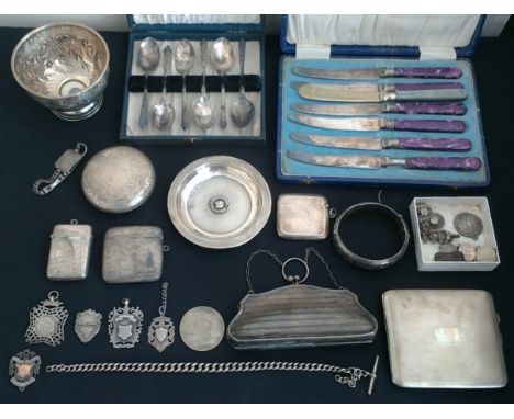 A collection of early to mid 20th Century hallmarked silver items, to include a bowl, a plate, a lidded pot, a watch chain, t