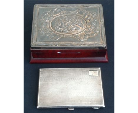 A silver cigarette case, hallmarked Birmingham 1929, weight approx. 195g, together with a silver topped wooden trinket box, s