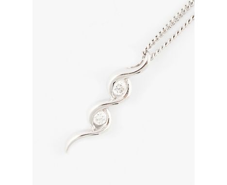 An 18ct white gold diamond pendant, the cross over design set with two round brilliant diamonds, each approx. 0.05ct, hallmar