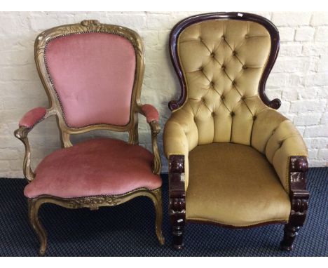 A pink and painted gold frame arm chair together with a mahogany framed button back chair.